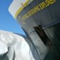 ship moored by berg Explorer docked on an iceberg