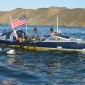 Mick completing his Pacific row in San Francisco last year, with Chris Martin